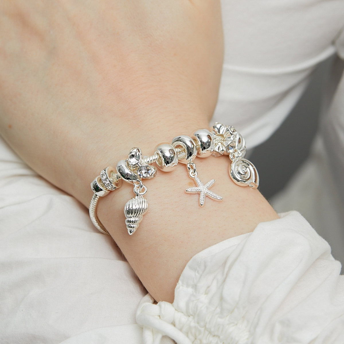 Lipsy Silver Coastal Charm Bracelet - Gift Boxed