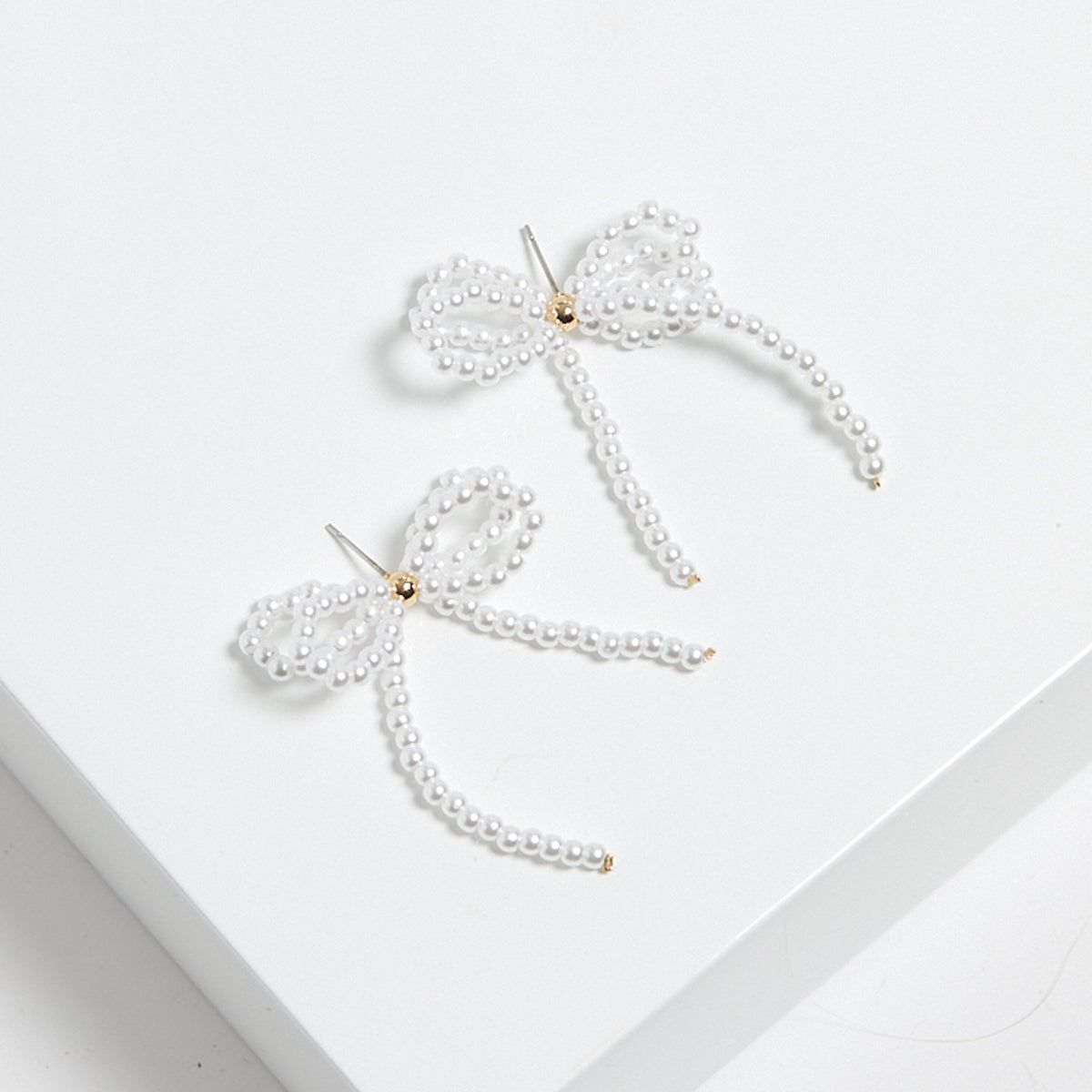 Mood Gold Pearl Bow Drop Earrings