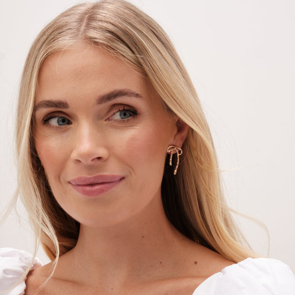 Mood Gold Hammered Polished Bow Earrings
