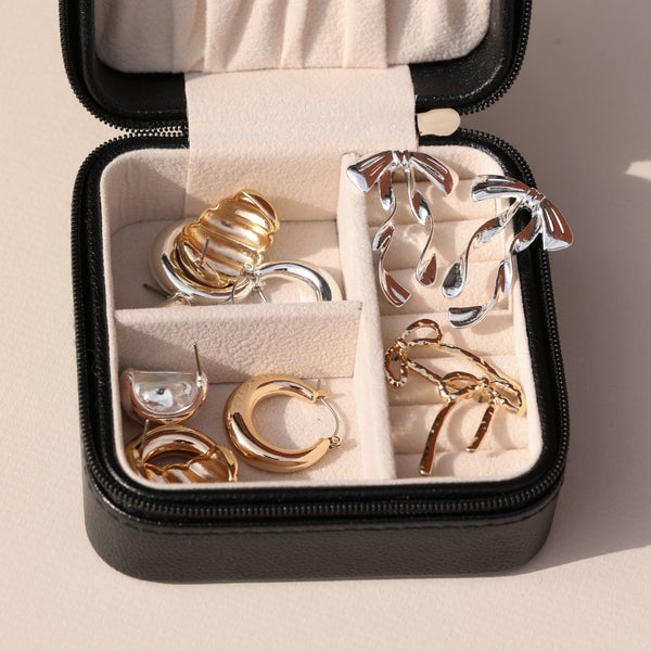 Mood Silver Polished Fluid Bow Earrings