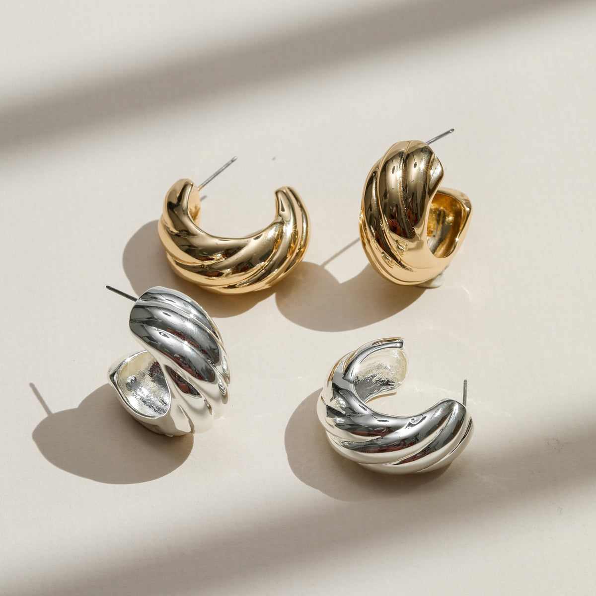 Mood Silver Polished Intertwined Hoop Earrings