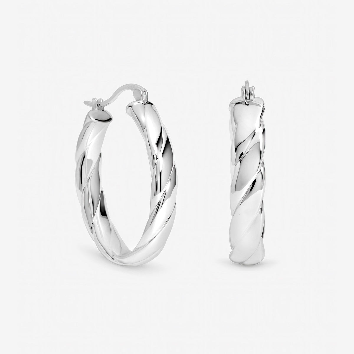 Inicio Sterling Silver Polished Textured Oval Hoop Earrings