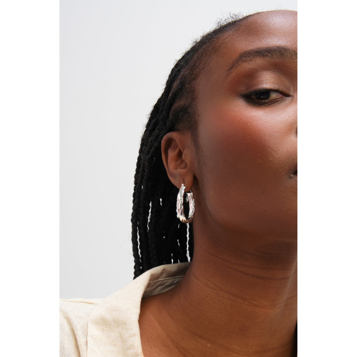 Inicio Sterling Silver Polished Textured Oval Hoop Earrings