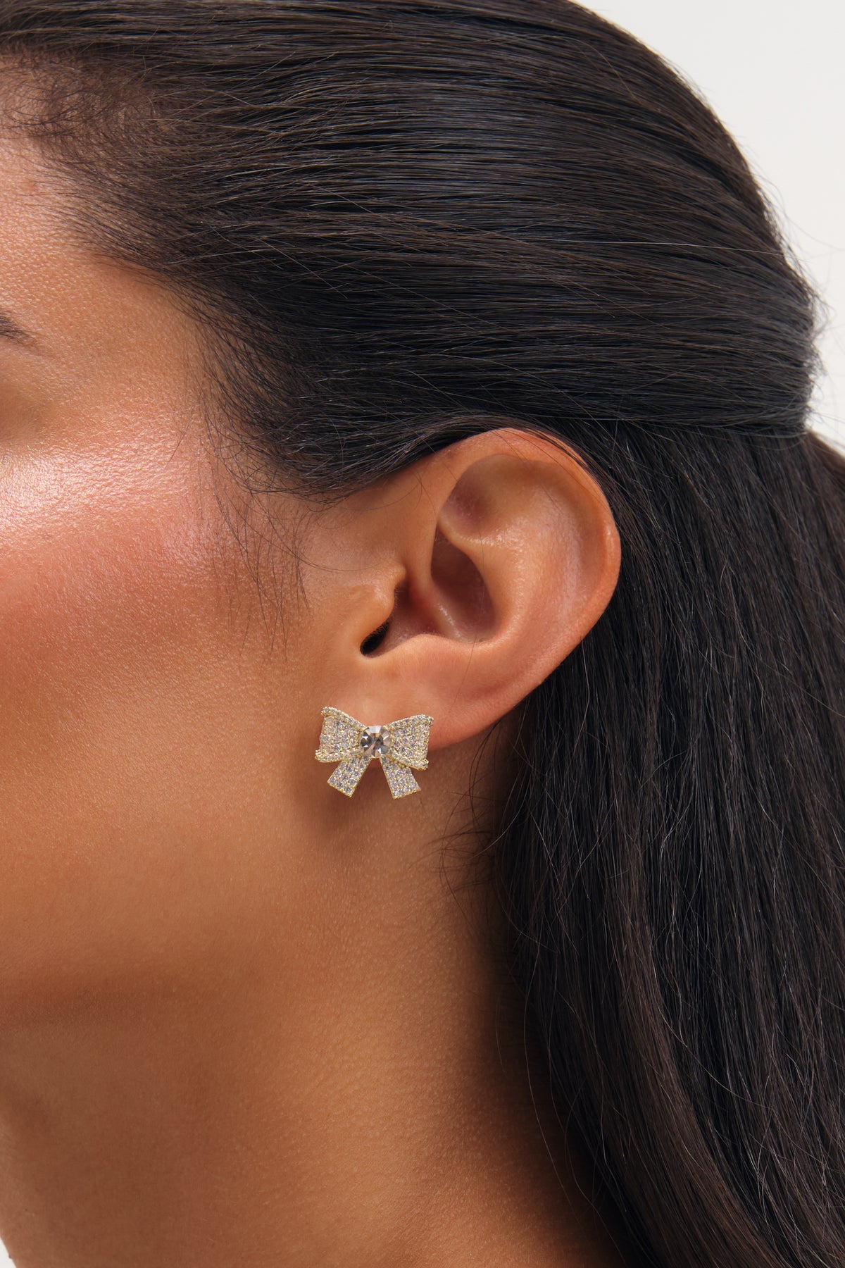 JON RICHARD GOLD PLATE AND PAVE AND CRYSTAL BOW EARRING