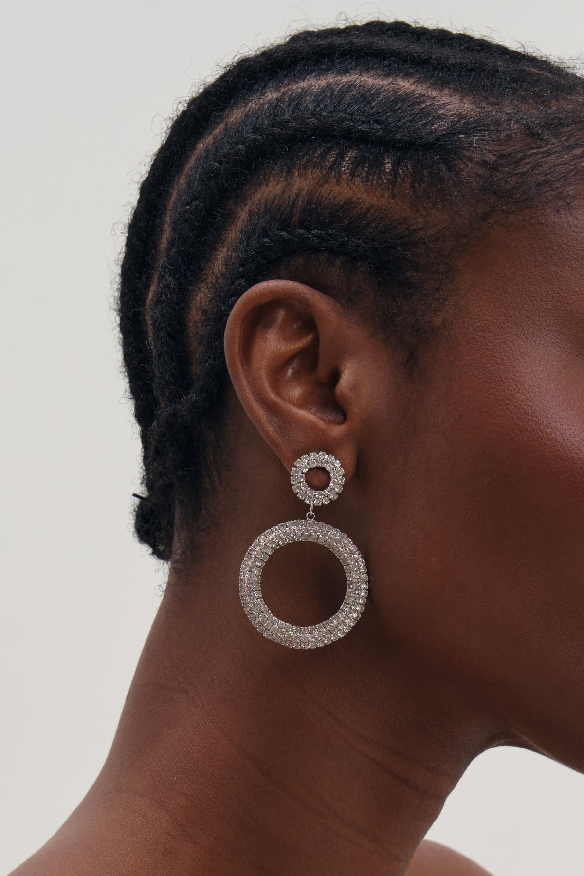 MOOD SILVER PLATE AND CRYSTAL OPEN CIRCLE STATEMENT EARRINGS