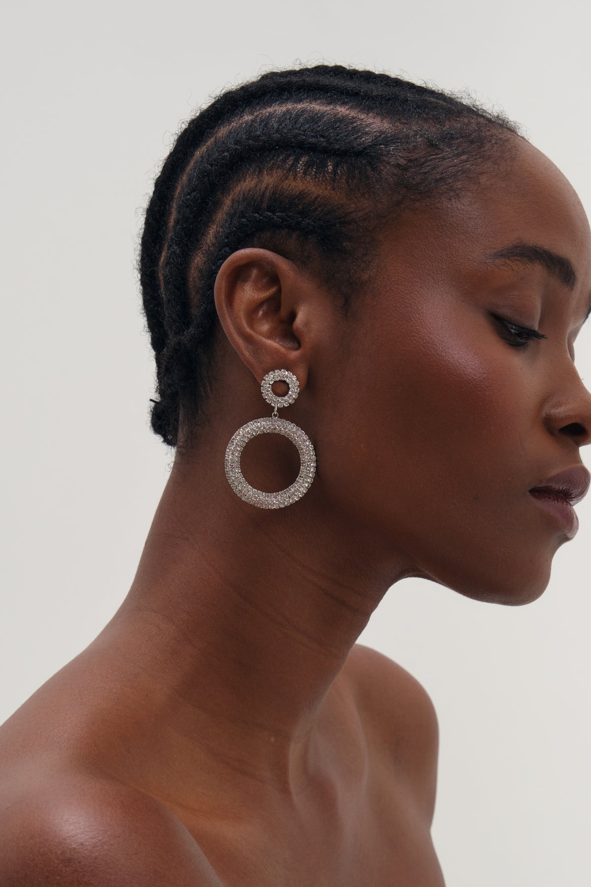 MOOD SILVER PLATE AND CRYSTAL OPEN CIRCLE STATEMENT EARRINGS