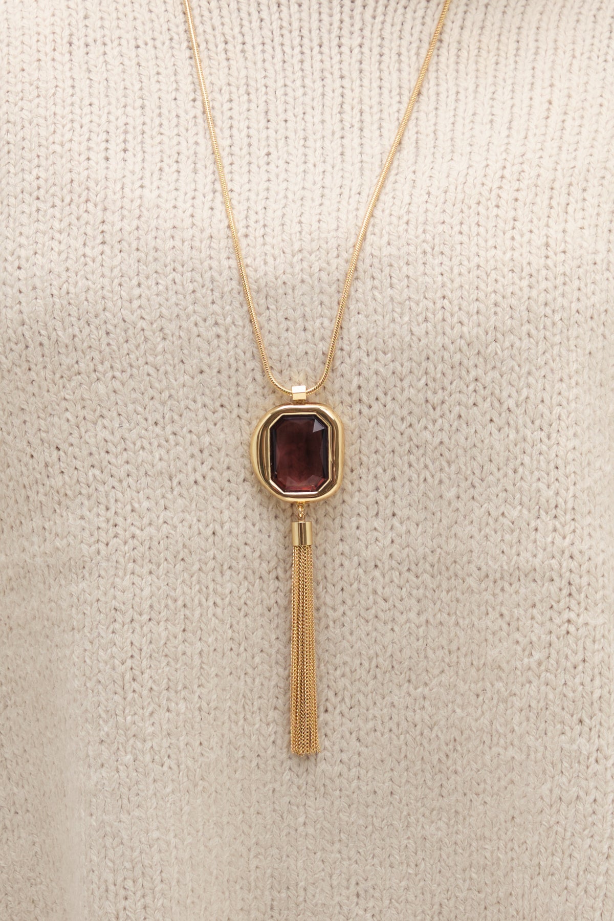 MOOD GOLD PLATE AND BURGUNDY STONE STATEMENT TASSEL PENDANT